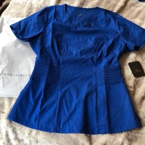Jaanuu Royal Blue scrub top.